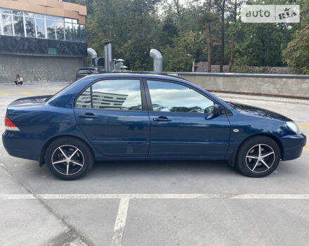 Синій Міцубісі Lancer, об'ємом двигуна 1.6 л та пробігом 206 тис. км за 5500 $, фото 6 на Automoto.ua
