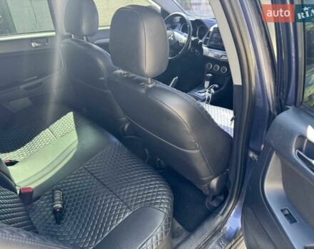 Синій Міцубісі Lancer, об'ємом двигуна 2 л та пробігом 300 тис. км за 5800 $, фото 11 на Automoto.ua