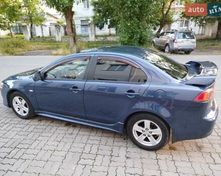 Синій Міцубісі Lancer, об'ємом двигуна 2 л та пробігом 290 тис. км за 5000 $, фото 2 на Automoto.ua