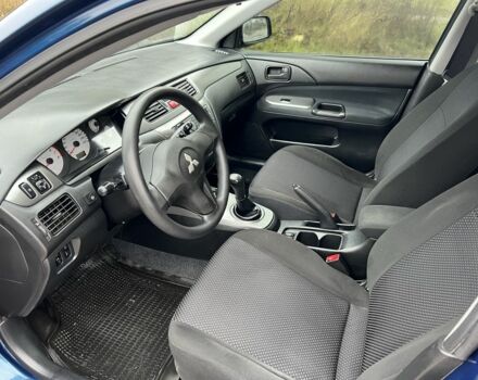 Синій Міцубісі Lancer, об'ємом двигуна 1.6 л та пробігом 126 тис. км за 5950 $, фото 9 на Automoto.ua