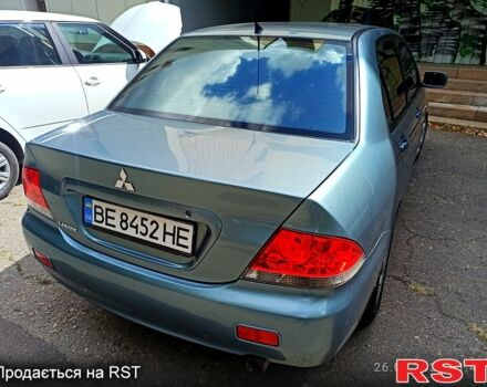 Синій Міцубісі Lancer, об'ємом двигуна 1.6 л та пробігом 168 тис. км за 5500 $, фото 2 на Automoto.ua