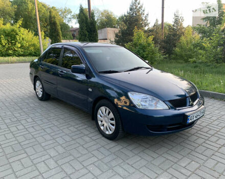 Синій Міцубісі Lancer, об'ємом двигуна 1.6 л та пробігом 200 тис. км за 4300 $, фото 8 на Automoto.ua