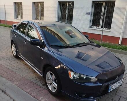 Синій Міцубісі Lancer, об'ємом двигуна 2 л та пробігом 290 тис. км за 5000 $, фото 4 на Automoto.ua