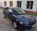 Синій Міцубісі Lancer, об'ємом двигуна 2 л та пробігом 290 тис. км за 5000 $, фото 4 на Automoto.ua