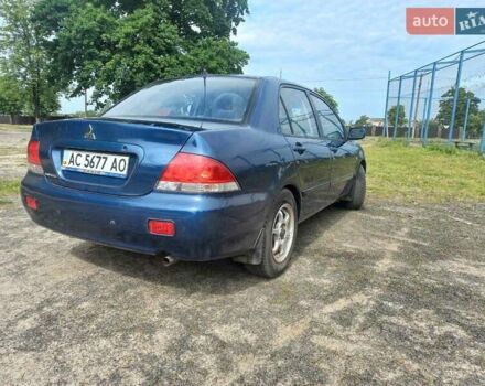 Синій Міцубісі Lancer, об'ємом двигуна 1.6 л та пробігом 275 тис. км за 5100 $, фото 2 на Automoto.ua