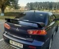 Синий Мицубиси Лансер, объемом двигателя 2 л и пробегом 142 тыс. км за 8000 $, фото 5 на Automoto.ua