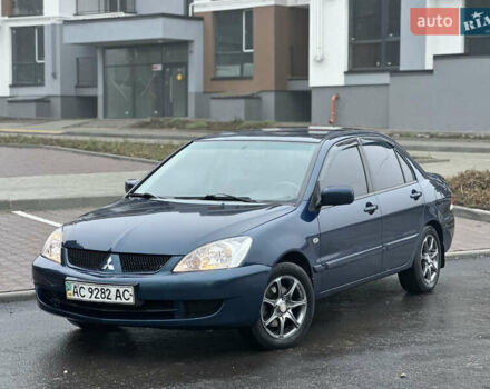 Синий Мицубиси Лансер, объемом двигателя 1.6 л и пробегом 187 тыс. км за 3799 $, фото 1 на Automoto.ua