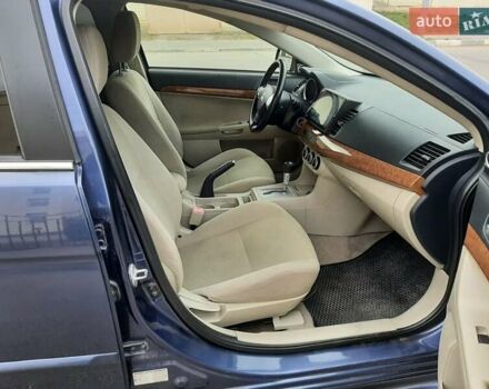 Синий Мицубиси Лансер, объемом двигателя 1.5 л и пробегом 220 тыс. км за 6999 $, фото 30 на Automoto.ua