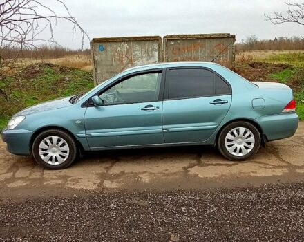 Синій Міцубісі Lancer, об'ємом двигуна 1.6 л та пробігом 167 тис. км за 4700 $, фото 2 на Automoto.ua