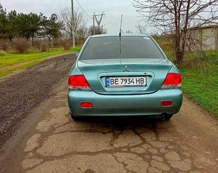 Синій Міцубісі Lancer, об'ємом двигуна 1.6 л та пробігом 167 тис. км за 4700 $, фото 5 на Automoto.ua