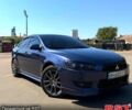Синій Міцубісі Lancer, об'ємом двигуна 2 л та пробігом 207 тис. км за 7500 $, фото 1 на Automoto.ua