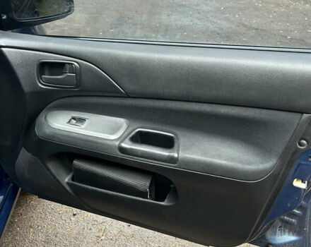 Синий Мицубиси Лансер, объемом двигателя 1.6 л и пробегом 150 тыс. км за 5700 $, фото 44 на Automoto.ua