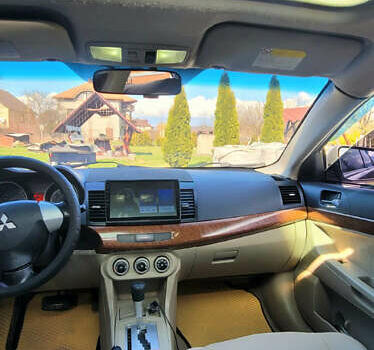 Синий Мицубиси Лансер, объемом двигателя 1.5 л и пробегом 241 тыс. км за 6500 $, фото 5 на Automoto.ua