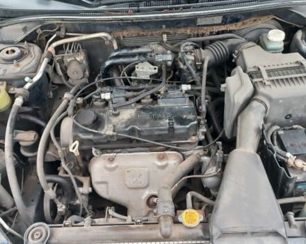 Синій Міцубісі Lancer, об'ємом двигуна 1.6 л та пробігом 220 тис. км за 4200 $, фото 4 на Automoto.ua