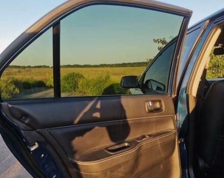 Синий Мицубиси Лансер, объемом двигателя 1.6 л и пробегом 197 тыс. км за 6500 $, фото 14 на Automoto.ua