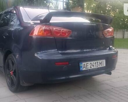 Синій Міцубісі Lancer, об'ємом двигуна 1.8 л та пробігом 223 тис. км за 7100 $, фото 3 на Automoto.ua