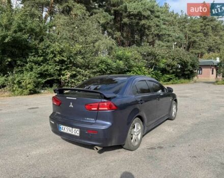 Синій Міцубісі Lancer, об'ємом двигуна 2 л та пробігом 300 тис. км за 5800 $, фото 6 на Automoto.ua