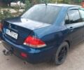 Синій Міцубісі Lancer, об'ємом двигуна 1.58 л та пробігом 220 тис. км за 4200 $, фото 5 на Automoto.ua