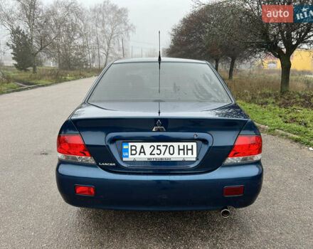Синий Мицубиси Лансер, объемом двигателя 1.59 л и пробегом 126 тыс. км за 5950 $, фото 5 на Automoto.ua
