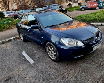 Синій Міцубісі Lancer, об'ємом двигуна 1.6 л та пробігом 298 тис. км за 2998 $, фото 3 на Automoto.ua