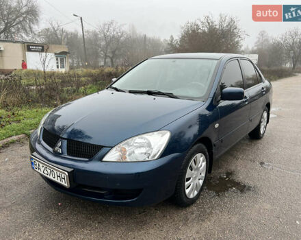 Синий Мицубиси Лансер, объемом двигателя 1.59 л и пробегом 126 тыс. км за 5950 $, фото 2 на Automoto.ua