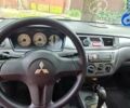 Синій Міцубісі Lancer, об'ємом двигуна 1.58 л та пробігом 215 тис. км за 5200 $, фото 20 на Automoto.ua