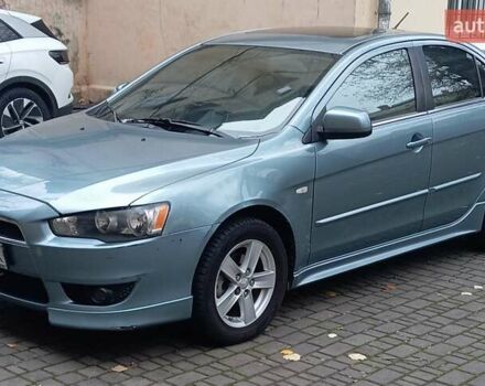 Синий Мицубиси Лансер, объемом двигателя 2 л и пробегом 300 тыс. км за 5600 $, фото 4 на Automoto.ua