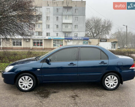 Синий Мицубиси Лансер, объемом двигателя 1.59 л и пробегом 126 тыс. км за 5950 $, фото 3 на Automoto.ua