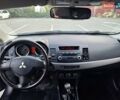 Синий Мицубиси Лансер, объемом двигателя 1.5 л и пробегом 250 тыс. км за 4000 $, фото 9 на Automoto.ua