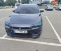 Синий Мицубиси Лансер, объемом двигателя 2 л и пробегом 213 тыс. км за 7300 $, фото 1 на Automoto.ua