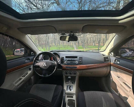 Синий Мицубиси Лансер, объемом двигателя 1.5 л и пробегом 250 тыс. км за 5150 $, фото 9 на Automoto.ua