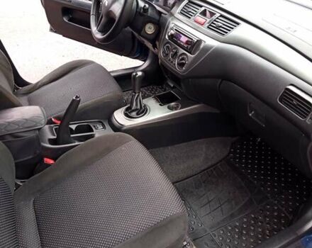 Синій Міцубісі Lancer, об'ємом двигуна 1.6 л та пробігом 206 тис. км за 5500 $, фото 4 на Automoto.ua