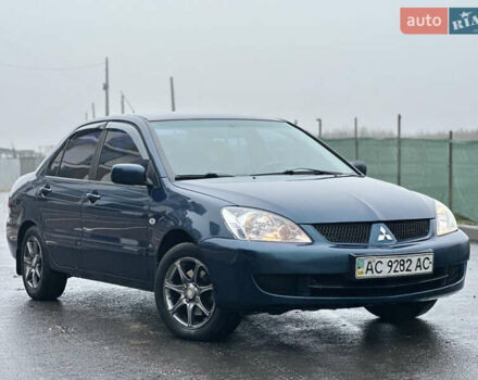 Синий Мицубиси Лансер, объемом двигателя 1.6 л и пробегом 187 тыс. км за 3799 $, фото 8 на Automoto.ua