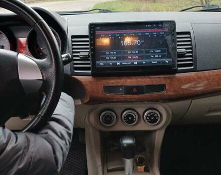 Синий Мицубиси Лансер, объемом двигателя 1.5 л и пробегом 220 тыс. км за 6999 $, фото 17 на Automoto.ua