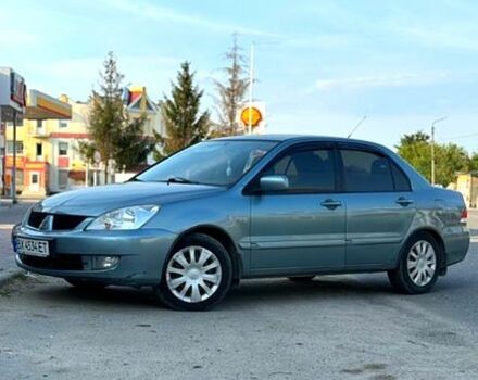 Синий Мицубиси Лансер, объемом двигателя 1.6 л и пробегом 200 тыс. км за 5000 $, фото 1 на Automoto.ua