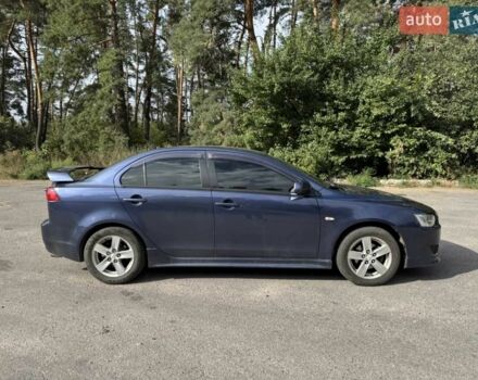 Синій Міцубісі Lancer, об'ємом двигуна 2 л та пробігом 300 тис. км за 5800 $, фото 7 на Automoto.ua