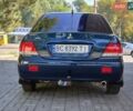 Синий Мицубиси Лансер, объемом двигателя 1.58 л и пробегом 176 тыс. км за 4700 $, фото 4 на Automoto.ua