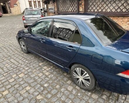 Міцубісі Lancer 2008 у Рівному на Automoto.ua Синій Міцубісі Lancer, об'ємом двигуна 1.6 л та пробігом 158 тис. км за 3900 $, фото 13 на Automoto.ua