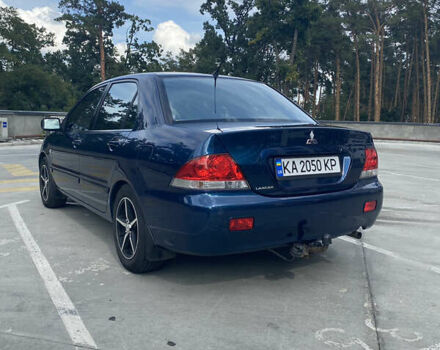 Синій Міцубісі Lancer, об'ємом двигуна 1.6 л та пробігом 206 тис. км за 5500 $, фото 4 на Automoto.ua