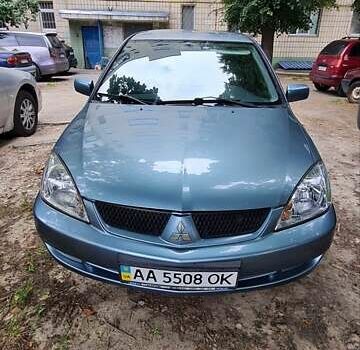 Синій Міцубісі Lancer, об'ємом двигуна 1.58 л та пробігом 215 тис. км за 5200 $, фото 2 на Automoto.ua