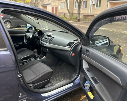 Міцубісі Lancer 2008 у Южноукраинске на Automoto.ua Синій Міцубісі Lancer, об'ємом двигуна 1.5 л та пробігом 176 тис. км за 5200 $, фото 6 на Automoto.ua