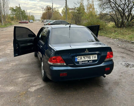 Синий Мицубиси Лансер, объемом двигателя 1.6 л и пробегом 150 тыс. км за 5700 $, фото 2 на Automoto.ua