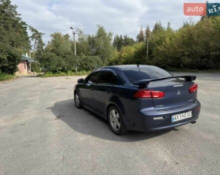 Синій Міцубісі Lancer, об'ємом двигуна 2 л та пробігом 300 тис. км за 5800 $, фото 4 на Automoto.ua