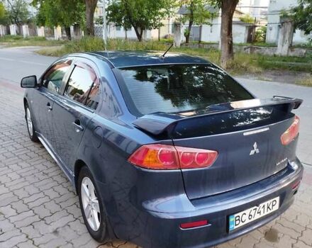 Синій Міцубісі Lancer, об'ємом двигуна 2 л та пробігом 290 тис. км за 5000 $, фото 3 на Automoto.ua