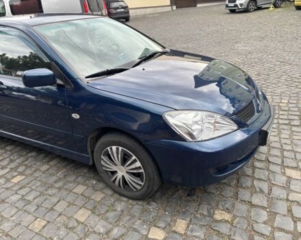 Міцубісі Lancer 2008 у Рівному на Automoto.ua Синій Міцубісі Lancer, об'ємом двигуна 1.6 л та пробігом 158 тис. км за 3900 $, фото 21 на Automoto.ua