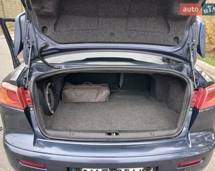 Синий Мицубиси Лансер, объемом двигателя 1.5 л и пробегом 220 тыс. км за 6999 $, фото 13 на Automoto.ua