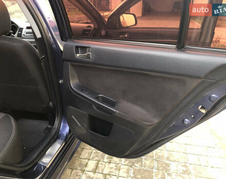 Синий Мицубиси Лансер, объемом двигателя 1.5 л и пробегом 263 тыс. км за 6700 $, фото 50 на Automoto.ua