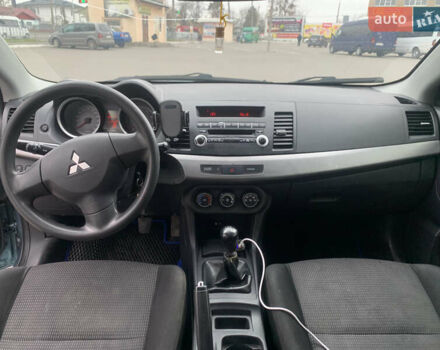 Синій Міцубісі Lancer, об'ємом двигуна 1.5 л та пробігом 250 тис. км за 4700 $, фото 6 на Automoto.ua