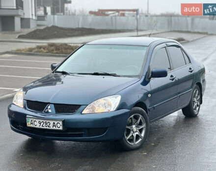 Синий Мицубиси Лансер, объемом двигателя 1.6 л и пробегом 187 тыс. км за 3799 $, фото 5 на Automoto.ua