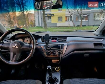 Синій Міцубісі Lancer, об'ємом двигуна 1.6 л та пробігом 298 тис. км за 2998 $, фото 1 на Automoto.ua